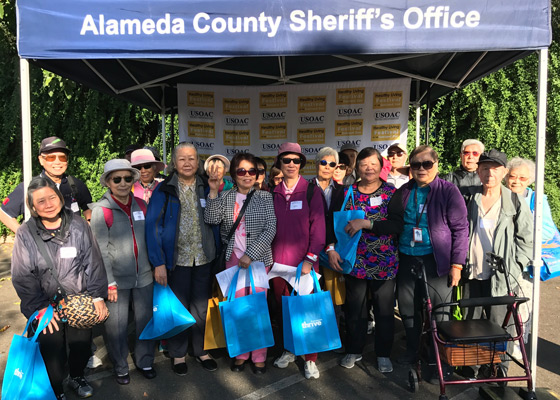 Supervisor Miley speaking with seniors of Alameda County