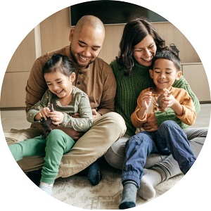 family sitting on floor