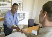 Photo of 2 men shaking hands